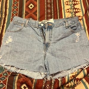 Distressed vintage 550 relaxed size 12 Levi’s denim cut off shorts. No stretch
